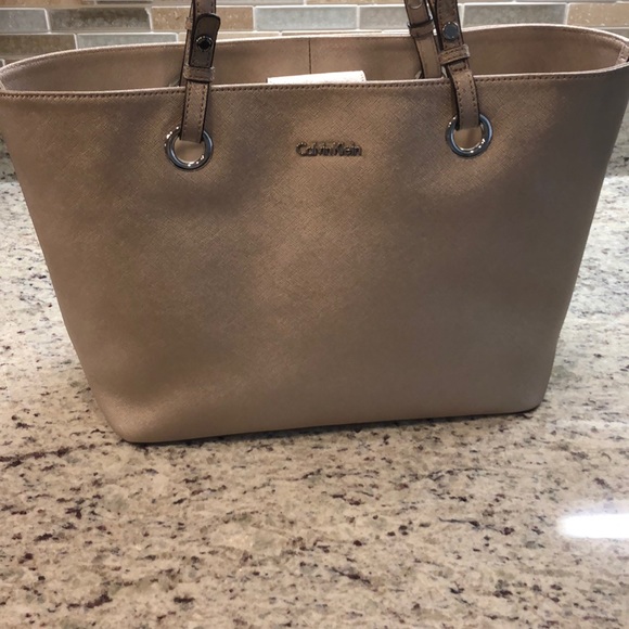 Calvin Klein Handbags - Silver Calvin Klein bucket tote